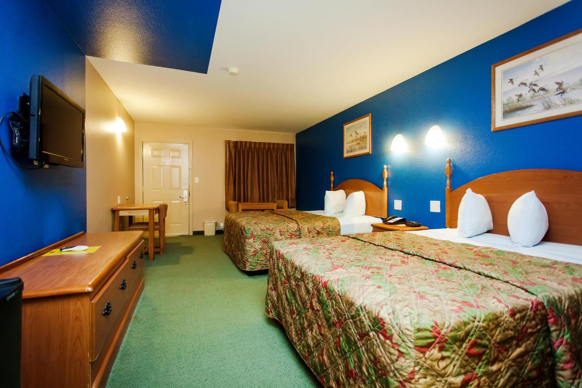 Scottish Inn & Suites Hankamer Стая снимка