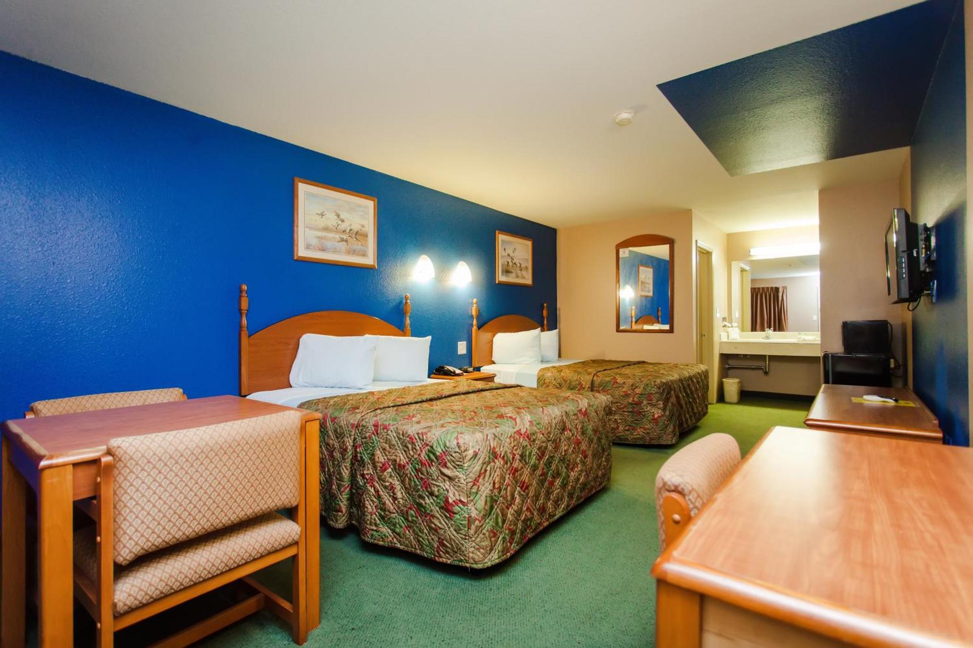 Scottish Inn & Suites Hankamer Стая снимка